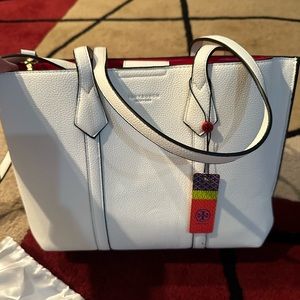 Brand new Tory purse got as a gift never used. Has a serial number.